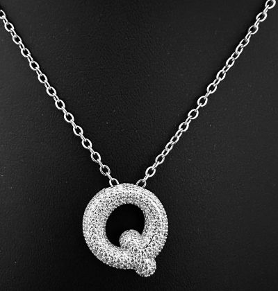 The Pavé Initial Pendant: A Personal Statement in Silver